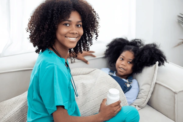 Professional personal care aide assisting elderly client with daily living activities in Aurora, Colorado